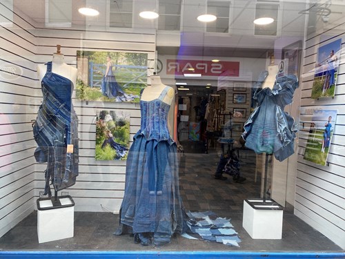 Hospice Shop Window displaying Lucia jean dresses